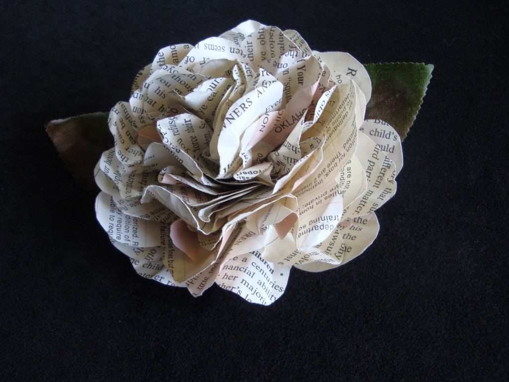 Flower made from an old book Book flowers are lovely just unadorned