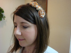 Book Flowers Even small book flowers hotglued to a plastic headband make an eye-catching accessory.