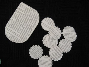 How to make Book Flower - Step 1 Shapes are punched (or cut) from paper removed in making a book safe