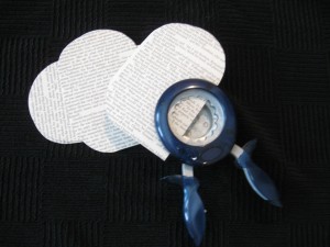 Making Book Flowers- still Step 1 Punches work, but are limited in size, while scissors can make circles as big as you like.